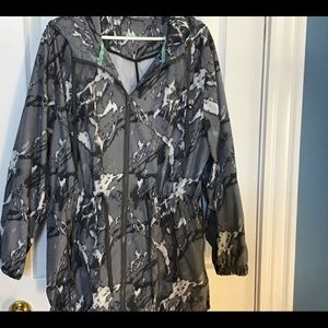 WINDBREAKER AND RAIN JACKET WITH A HOOD